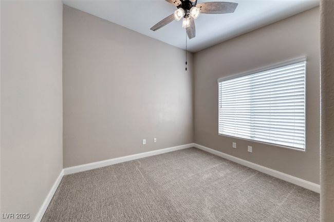 Unfurnished room with a ceiling fan and light carpet | Image 26