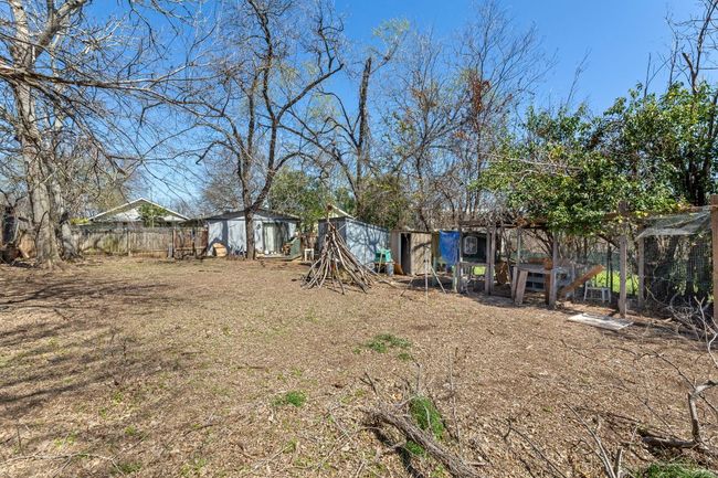 View of yard with an outdoor structure, exterior structure, and fence | Image 21