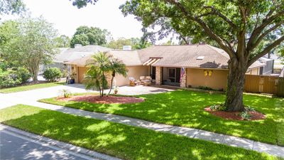 16607 E Course Drive, House other with 4 bedrooms, 3 bathrooms and null parking in Tampa FL | Image 2