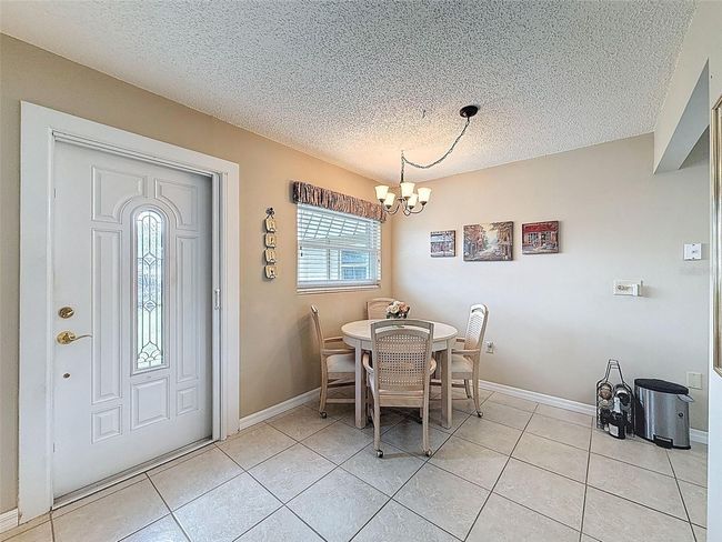 11821 Boynton Ln, Condo with 2 bedrooms, 2 bathrooms and null parking in New Port Richey FL | Image 5