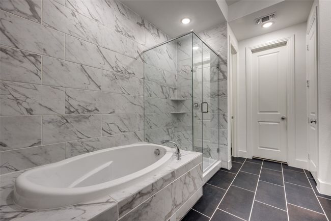 Full bathroom featuring visible vents, a shower stall, recessed lighting, tile patterned floors, and a garden tub | Image 16