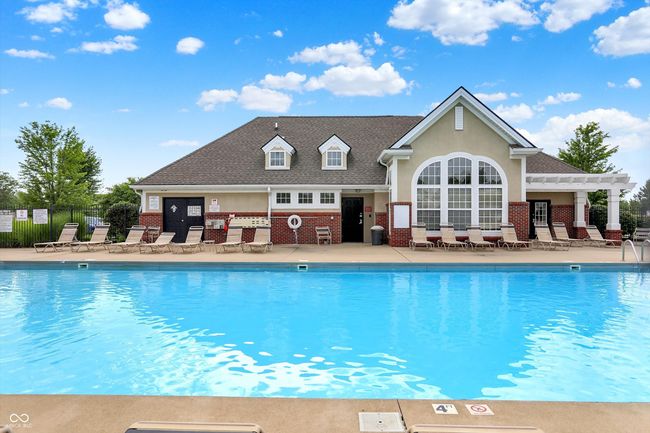 community pool featuring a patio area and a pergola | Image 39