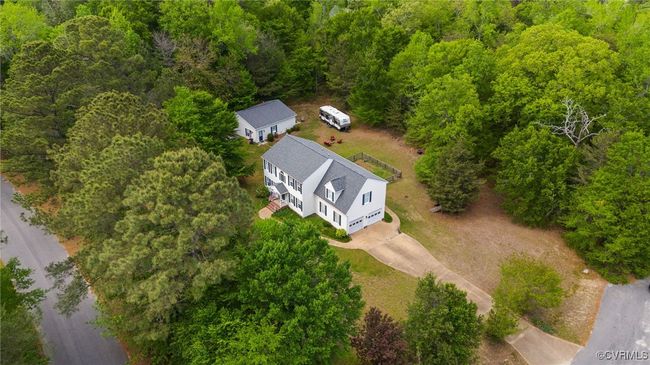 Bird's eye view featuring a forest view | Image 5