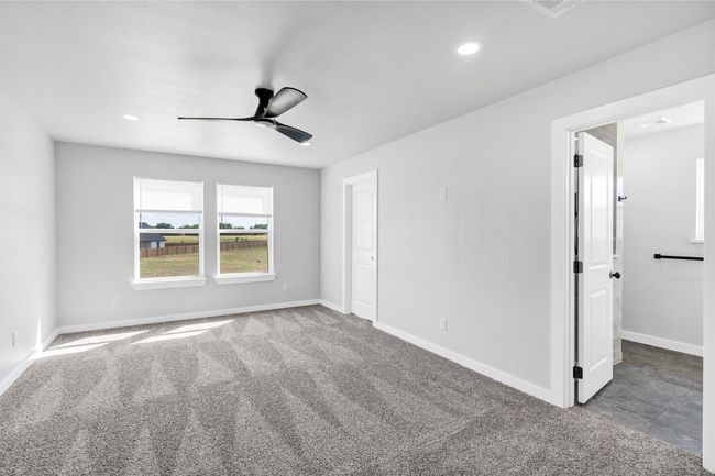 Unfurnished bedroom featuring recessed lighting, baseboards, and carpet flooring | Image 23
