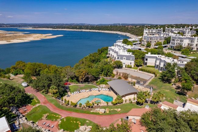 Bird's eye view of a large body of water and a pool area | Image 32