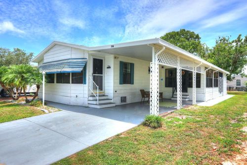 714 Amaryllis Dr, Barefoot Bay, FL, 32976-7180 | Card Image