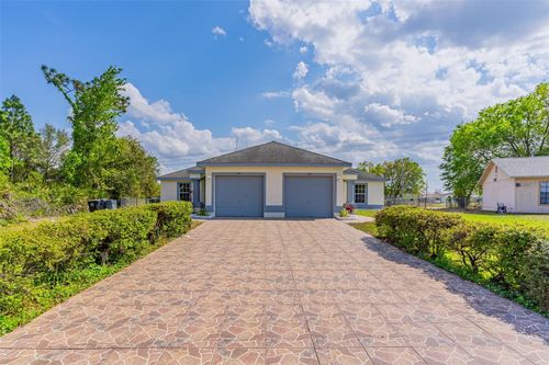 748 Mink Ct, POINCIANA, FL, 34759-4321 | Card Image