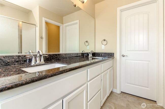 Primary bathroom with walk in closet. | Image 18