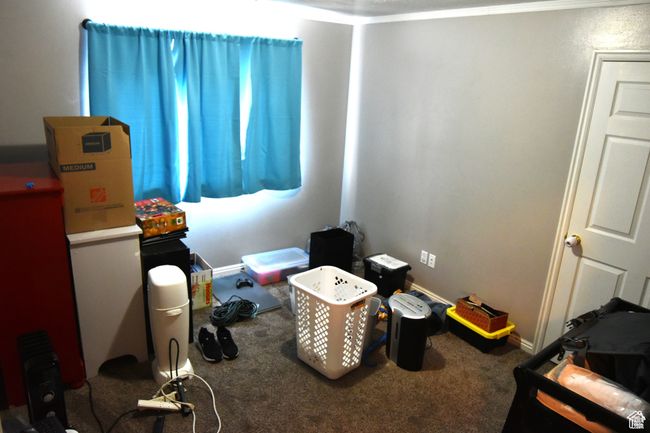 Bedroom featuring carpet floors | Image 8