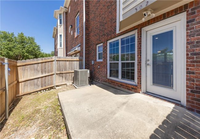 View of patio featuring fence and central AC unit | Image 9