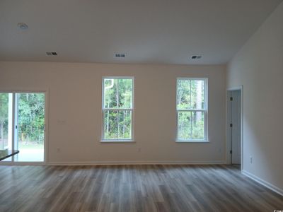 Spare room with hardwood / wood-style flooring | Image 3