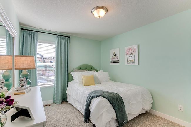 Space is also abundant throughout the rest of the home's upper level bedrooms. Model home photo, colors and selections may vary. | Image 13