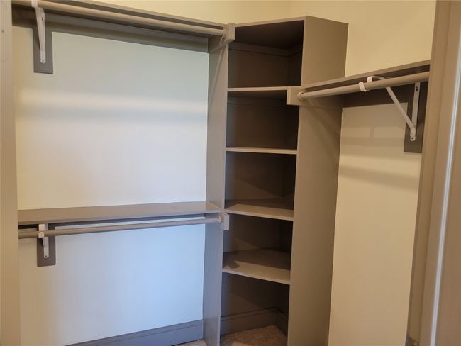 View of walk in closet | Image 15