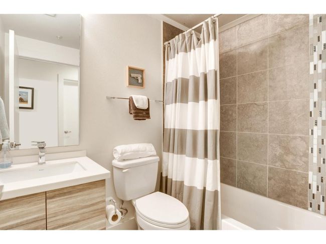 Full bathroom with vanity and shower / bath combo with shower curtain | Image 12