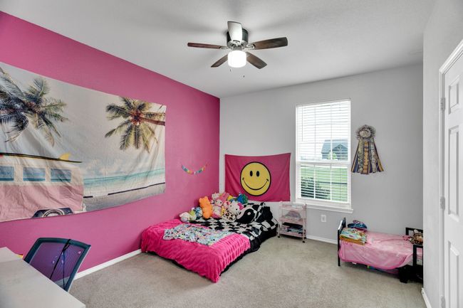 Carpeted bedroom featuring baseboards and ceiling fan | Image 12