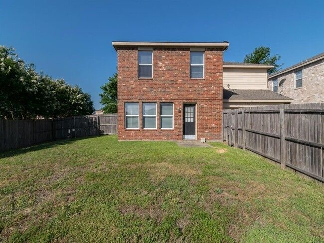 Rear view of property with a lawn | Image 22
