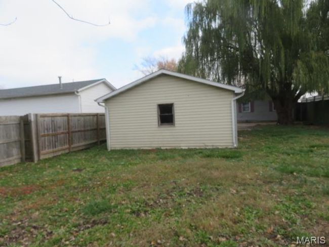 Exterior space featuring an outbuilding and a lawn | Image 27