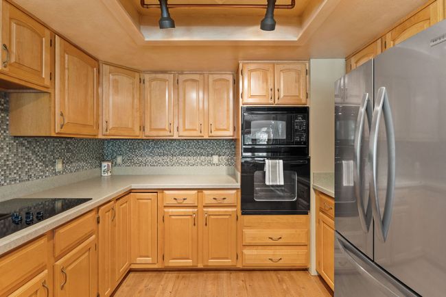 Formica countertops, glass backsplash | Image 12