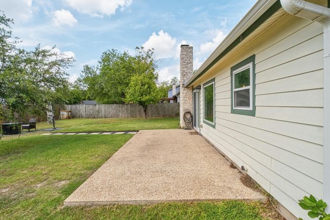 Fenced backyard featuring a patio | Image 31