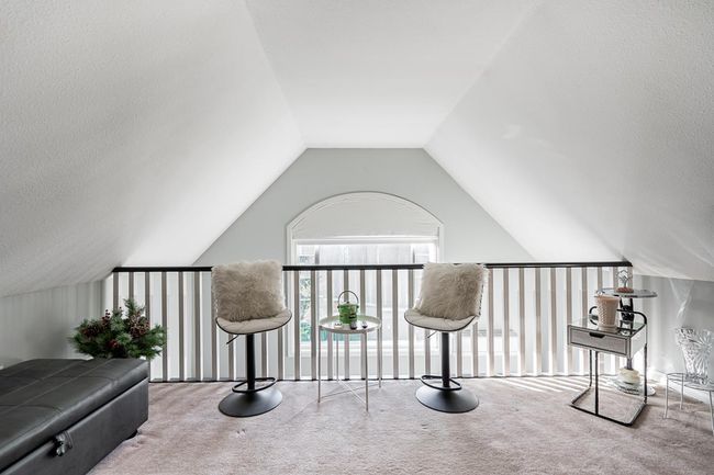 Living area with carpet floors and vaulted ceiling | Image 24