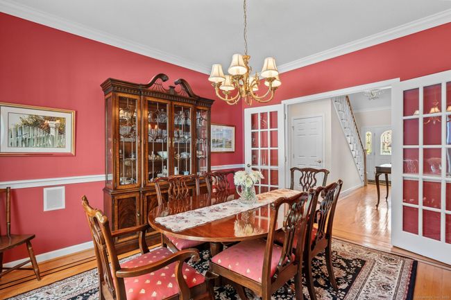 Note the handsome French doors and chair rails. | Image 18
