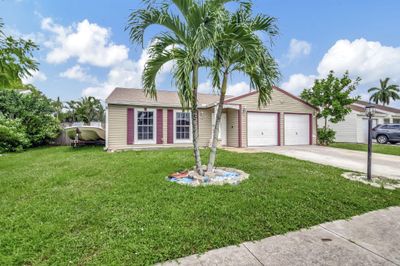 5279 Canal Circle W, House other with 3 bedrooms, 2 bathrooms and null parking in Lake Worth FL | Image 2