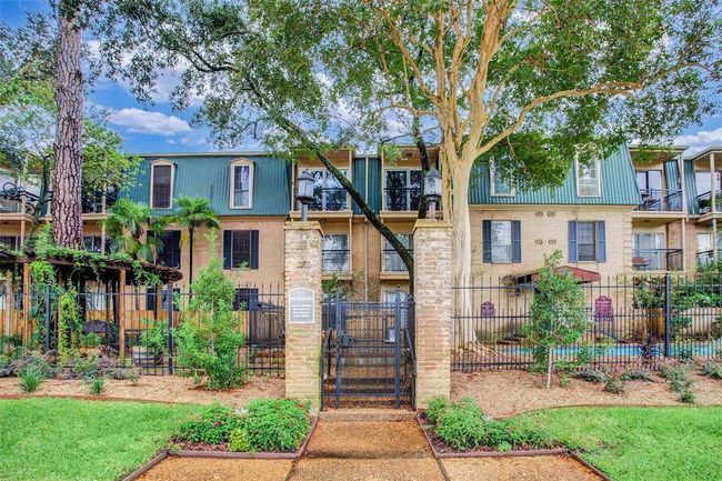 Quaint gated condo located just inside the loop and a few blocks from River Oaks District, Uptown Park, the Galleria and 610!Lots of street parking for guests. This condo has 2 revered, covered parking spaces. This gated parking lot has an automatic gate. | Image 14