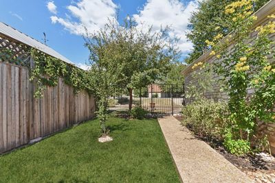 The home is set back off the road, offering lots of privacy! Digitally enhanced to show greener grass. | Image 3