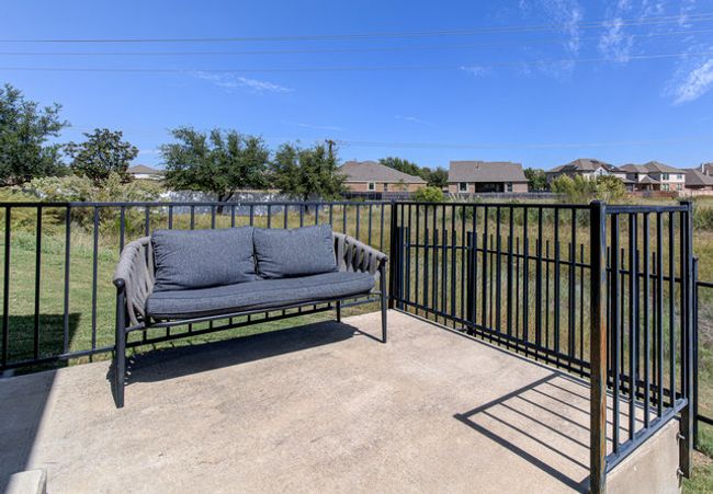 View of patio featuring a residential view and a balcony | Image 17