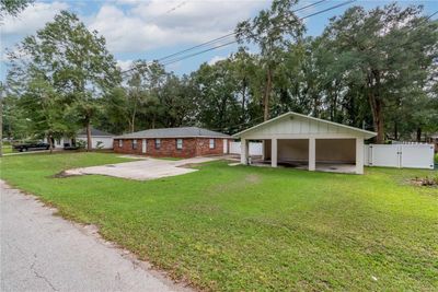 5456 Nw 64th Street, House other with 5 bedrooms, 3 bathrooms and null parking in Ocala FL | Image 3