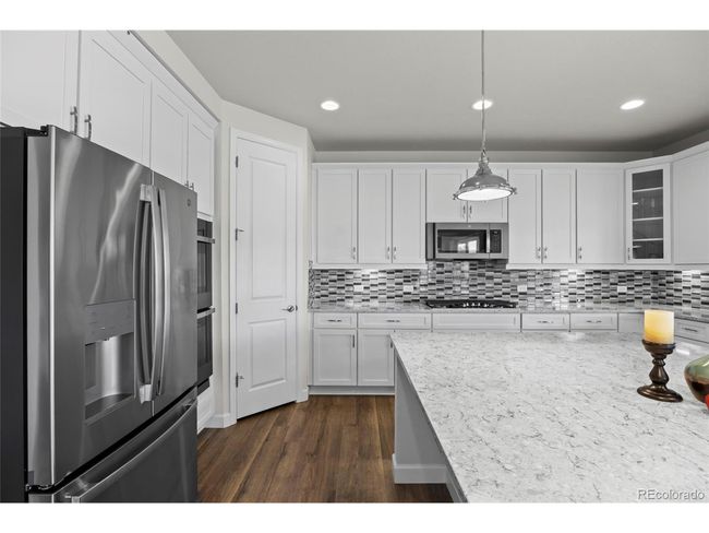 7166 S Vandriver Way, House other with 6 bedrooms, 5 bathrooms and null parking in Aurora CO | Image 10