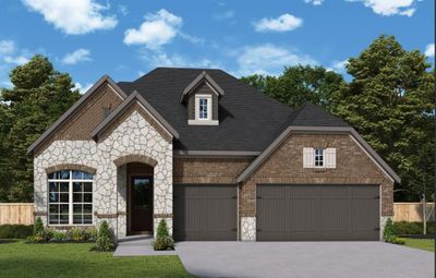 The Hennessey offers a beautiful brick and stone exterior with a full 3 car garage! | Image 1