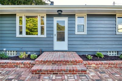 Back door entrance with a 11X29 brick patio | Image 3