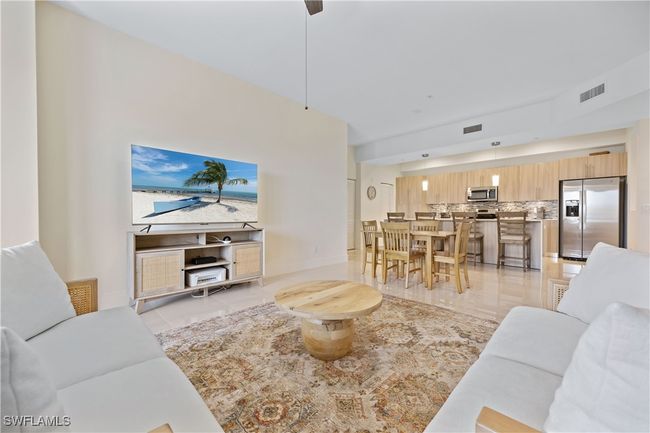 Living room featuring visible vents and light tile patterned floors | Image 20