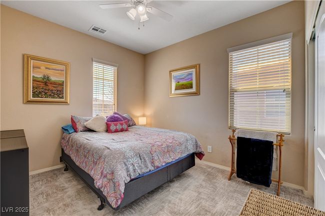 Guest Bedroom with a ceiling fan | Image 47