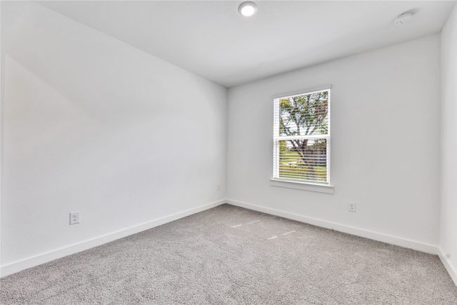 Carpeted empty room with baseboards | Image 18