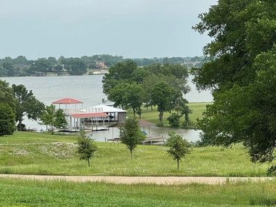 Dock area with a water view and a yard | Image 3