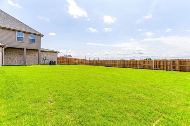 View of yard featuring central AC unit | Image 36
