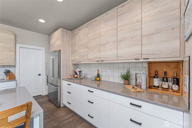 Sleek, high-quality appliances are all included, making this move-in ready home perfectly equipped for effortless living and entertaining from day one | Image 8