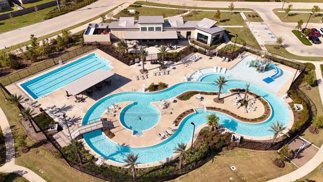 Cool off at the community’s resort-style pool complete with a lazy river, lap lanes, and splash zones, an inviting escape for sunny afternoons and weekends at home. | Image 34