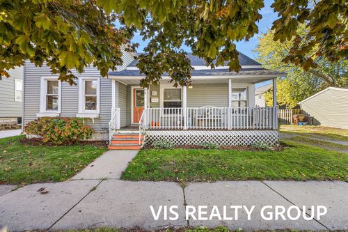 508 Monroe Ave, Grand Haven, MI, 49417-1063 | Card Image