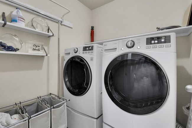 Washroom featuring laundry area and independent washer and dryer | Image 15
