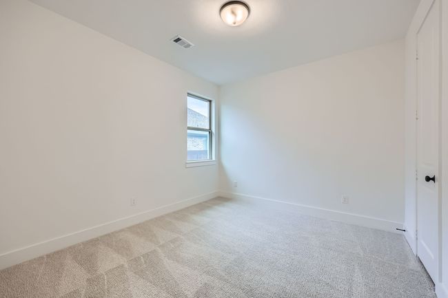 Unfurnished room featuring light colored carpet, baseboards, and visible vents | Image 20
