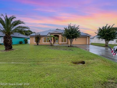 1121 Douglas Street Se, House other with 4 bedrooms, 3 bathrooms and null parking in Palm Bay FL | Image 1