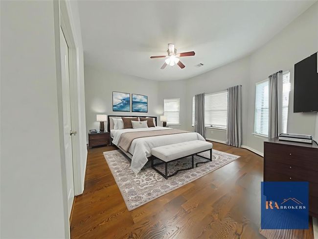 Upstairs secondary bedroom with private ensuite bath. (virtually staged) | Image 28