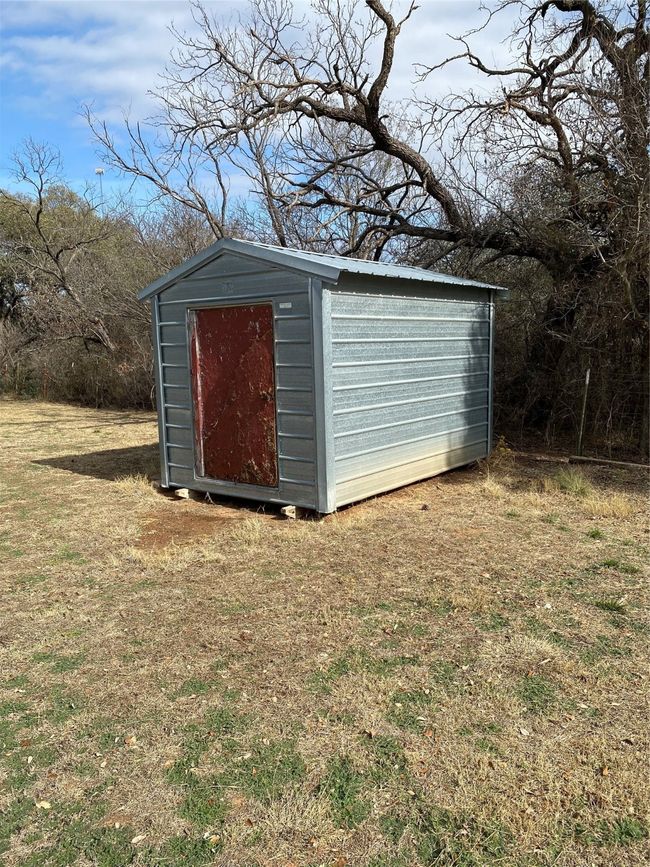 View of outbuilding with a yard | Image 4