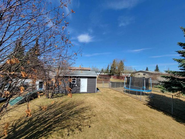 9406 81 Avenue, Home with 4 bedrooms, 2 bathrooms and 2 parking in Grande Prairie AB | Image 31