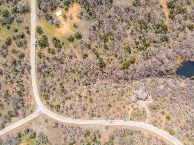 Aerial view of property and surrounding area featuring a desert landscape | Image 6
