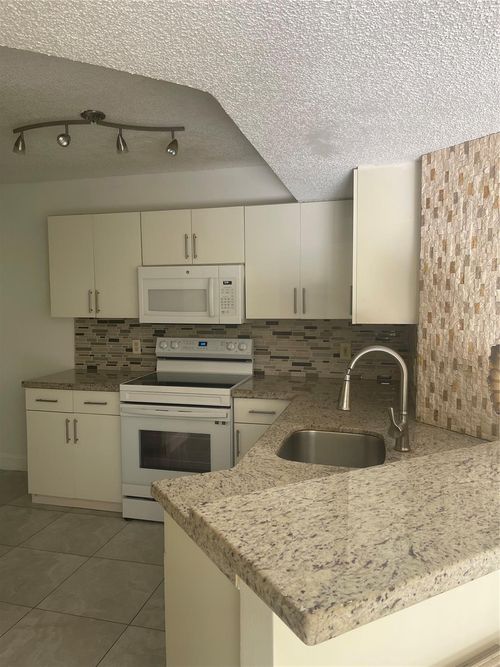 apt-208-8801 Wiles Rd, Coral Springs, FL, 33067-1830 | Card Image