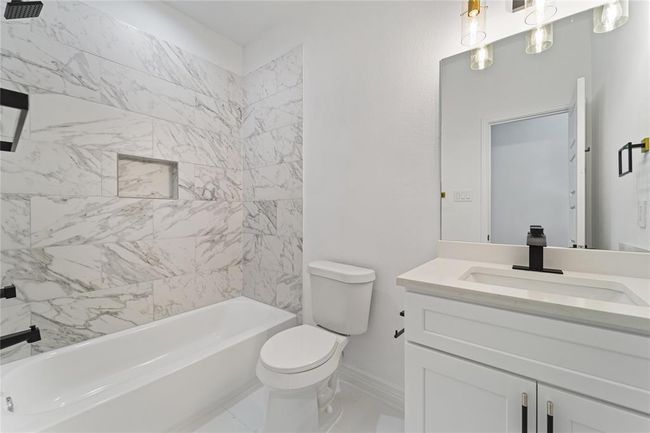 9023 Comal St, House other with 3 bedrooms, 3 bathrooms and 1 parking in Houston TX | Image 22